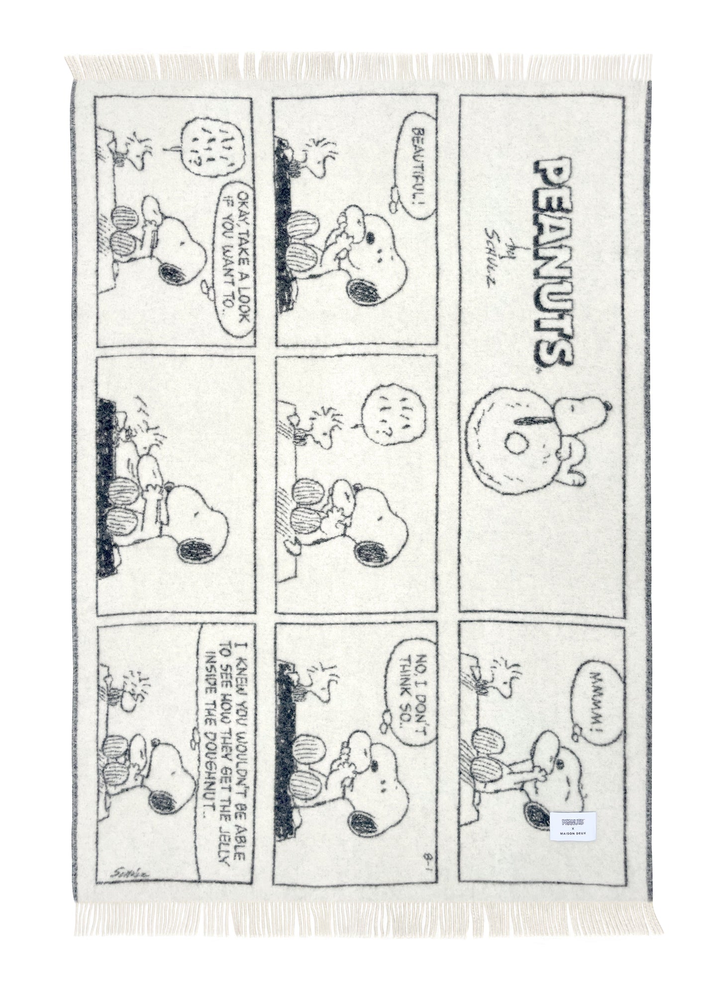 Peanuts Ullpledd black, en del av kategorien Pledd - At Home Interiør