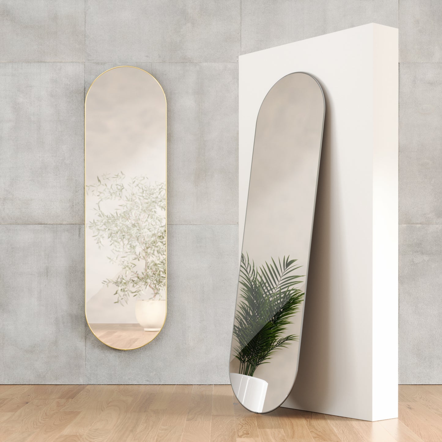 Hubba Pill Mirror fra Umbra med høy, avlang form og metallramme.